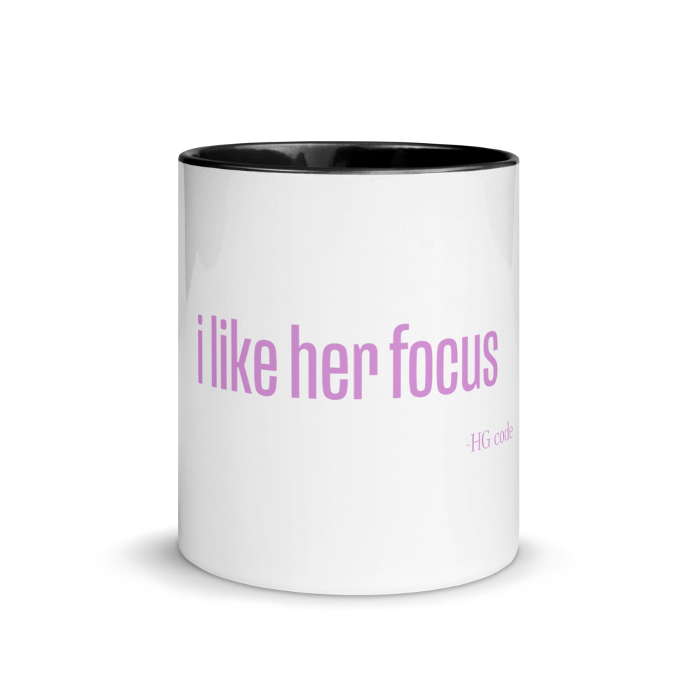 "i like her focus" mug with color rim